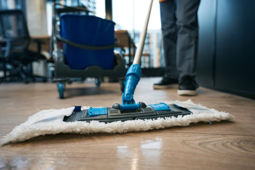 Professional commercial cleaners maintaining Plano TX office building